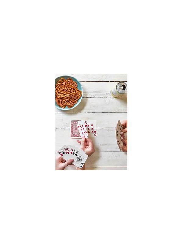 Rummy FAQ: Should You Take a Discard That Completes a Pair?